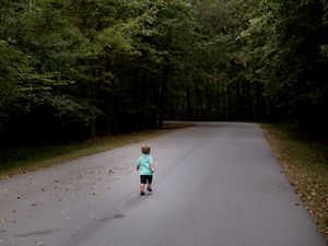 Preview wallpaper child, run, road, forest, asphalt