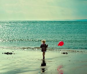 Preview wallpaper child, sea, ball, sand, walk