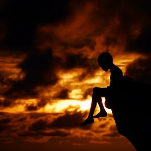 Preview wallpaper child, silhouette, cliff, think, sky, clouds