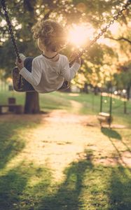 Preview wallpaper child, swing, sun, sunlight, summer