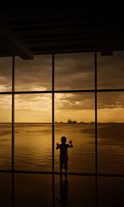 Preview wallpaper child, window, silhouette, sea, clouds, sunset