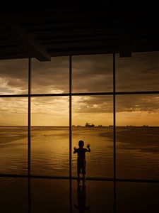 Preview wallpaper child, window, silhouette, sea, clouds, sunset