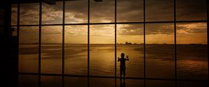 Preview wallpaper child, window, silhouette, sea, clouds, sunset