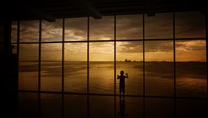 Preview wallpaper child, window, silhouette, sea, clouds, sunset