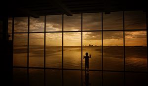Preview wallpaper child, window, silhouette, sea, clouds, sunset