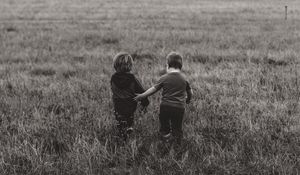 Preview wallpaper children, couple, field, walk, friendship, bw