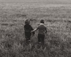 Preview wallpaper children, couple, field, walk, friendship, bw