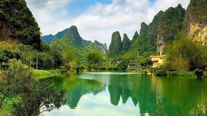 Preview wallpaper china, pond, coast, water, surface, mountains, woods
