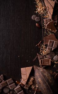 Preview wallpaper chocolate, chocolates, cocoa, wooden, surface