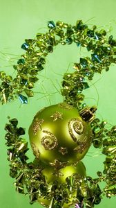 Preview wallpaper christmas decorations, balloon, stones, candle, candlestick, green background