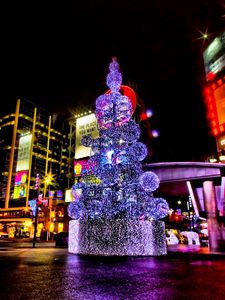 Preview wallpaper christmas, holiday, tree, street, night, area