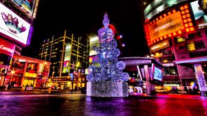Preview wallpaper christmas, holiday, tree, street, night, area