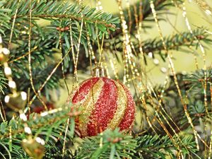 Preview wallpaper christmas, new year, fur-tree, attribute, sphere, red, ornament, rain