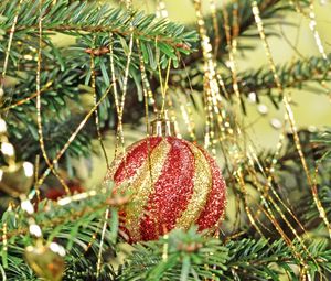 Preview wallpaper christmas, new year, fur-tree, attribute, sphere, red, ornament, rain
