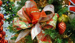 Preview wallpaper christmas, new year, tree needles, toys, bow