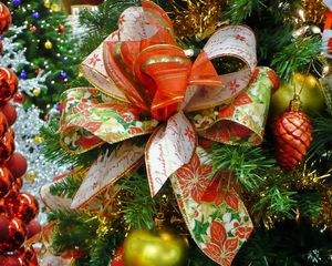 Preview wallpaper christmas, new year, tree needles, toys, bow