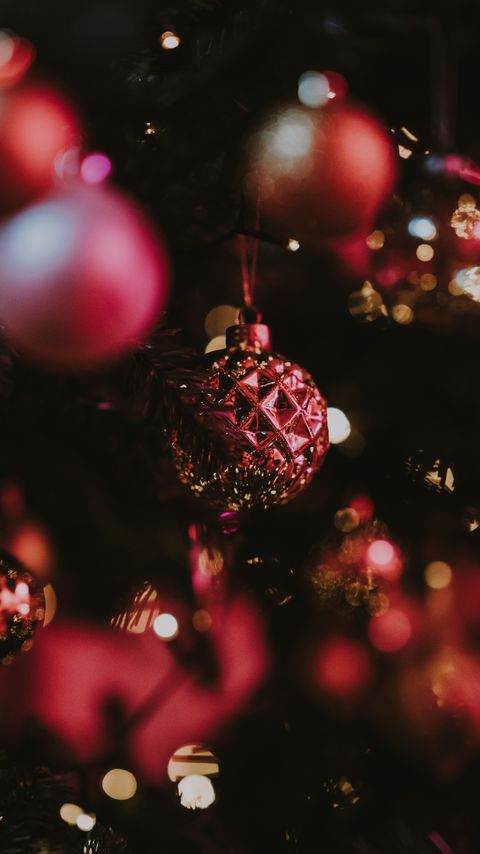 480x854 Wallpaper christmas toy, ball, glitter, glare, bokeh, christmas, new year