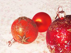 Preview wallpaper christmas toys, balls, three, glitter, close-up