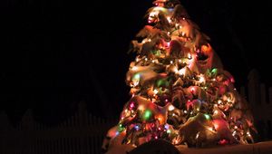 Preview wallpaper christmas tree, garland, snow, street, holiday, christmas, night