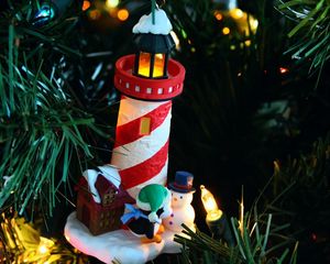 Preview wallpaper christmas tree, garlands, house, lighthouse, penguin, snowman, figurines, holiday