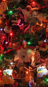Preview wallpaper christmas tree, garlands, ornaments, toys, cat, new year, celebration
