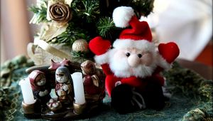 Preview wallpaper christmas tree, santa claus, candles, toys, stand