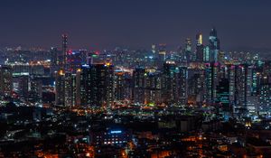 Preview wallpaper city, aerial view, architecture, buildings, night, city lights, cityscape, panorama