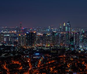 Preview wallpaper city, aerial view, architecture, buildings, night, city lights, cityscape, panorama