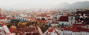 Preview wallpaper city, aerial view, buildings, architecture, roofs