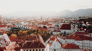 Preview wallpaper city, aerial view, buildings, architecture, roofs