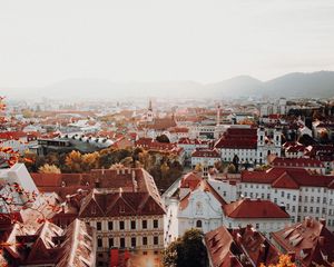 Preview wallpaper city, aerial view, buildings, architecture, roofs