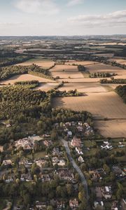 Preview wallpaper city, aerial view, buildings, fields, trees