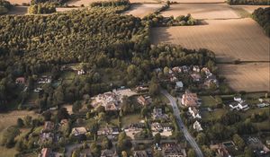 Preview wallpaper city, aerial view, buildings, fields, trees