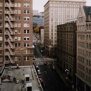 Preview wallpaper city, aerial view, buildings, road, street