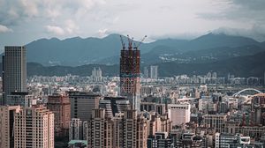 Preview wallpaper city, aerial view, buildings, mountains, architecture