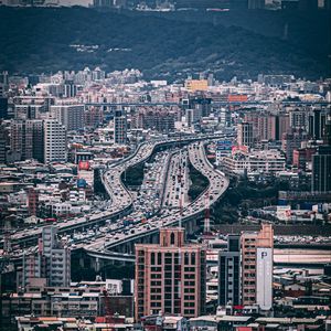 Preview wallpaper city, aerial view, buildings, roads, architecture