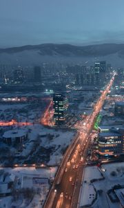 Preview wallpaper city, aerial view, buildings, road, mountain, snow