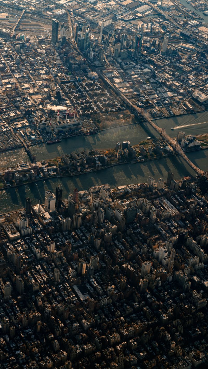 Download wallpaper 800x1420 city, aerial view, buildings, river, new ...