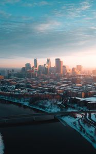 Preview wallpaper city, aerial view, buildings, river, bridge, winter