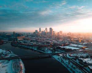 Preview wallpaper city, aerial view, buildings, river, bridge, winter