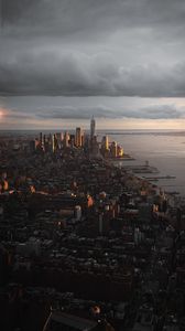 Preview wallpaper city, aerial view, buildings, coast, sunset, dusk