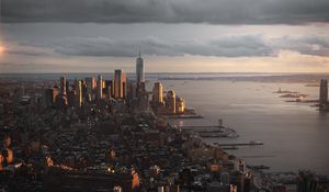 Preview wallpaper city, aerial view, buildings, coast, sunset, dusk