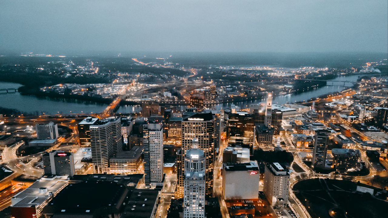 Wallpaper city, aerial view, buildings, lights, river, horizon