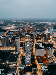 Preview wallpaper city, aerial view, buildings, lights, river, horizon