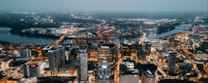 Preview wallpaper city, aerial view, buildings, lights, river, horizon