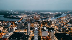 Preview wallpaper city, aerial view, buildings, lights, river, horizon