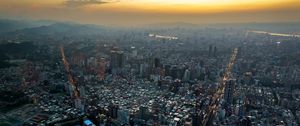 Preview wallpaper city, aerial view, buildings, sunset, overview