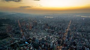 Preview wallpaper city, aerial view, buildings, sunset, overview