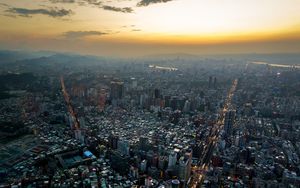 Preview wallpaper city, aerial view, buildings, sunset, overview