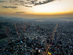 Preview wallpaper city, aerial view, buildings, sunset, overview